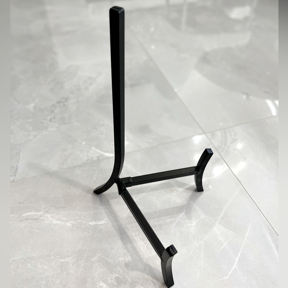A black iron, book or picture, stand. (NWOT)